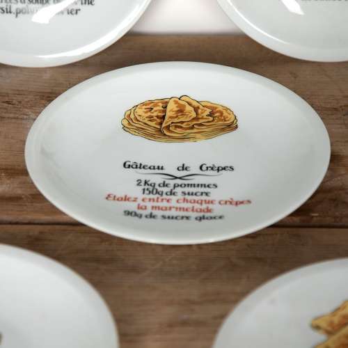 Set of Eight 20th Century Novelty Crepe Recipe Plates