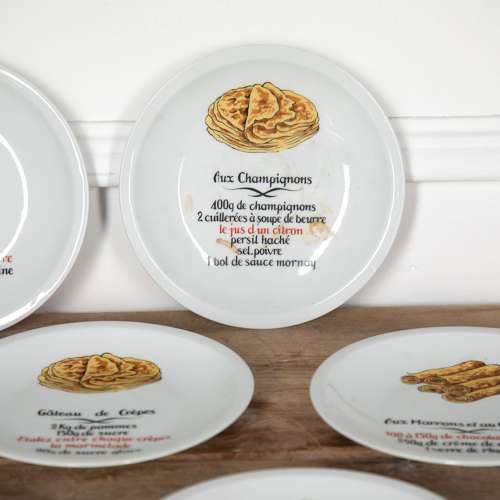 Set of Eight 20th Century Novelty Crepe Recipe Plates